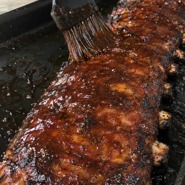 Ribs being glazed